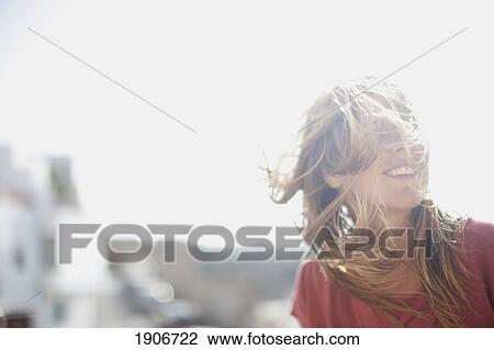 a girl's hair blowing in the wind; houten, the netherlands View Large Photo Image Stock Image - a girl's hair blowing in the wind; houten, the netherlands. Fotosearch