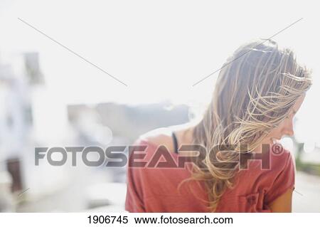 a girl's hair blowing in the wind; tarifa, cadiz, andalusia, spain View Large Photo Image Stock Photography - a girl's hair blowing in the wind; tarifa, cadiz, andalusia, spain. Fotosearch