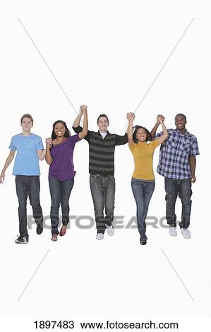 a group of young adults walking hand in hand; portland, oregon, united states of america View Large Photo Image Stock Image - a group of young adults walking hand in hand; portland, oregon, united states of america. Fotosearch