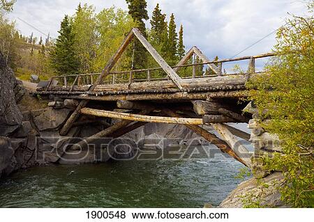 a historic log bridge, frontier bridge; haines junction, yukon territory, canada View Large Photo Image Stock Photo - a historic log bridge, frontier bridge; haines junction, yukon territory, canada. Fotosearch