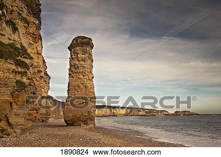 a large rock formation on the shore along the coast; south shields, tyne and wear, england View Large Photo Image Picture - a large rock formation on the shore along the coast; south shields, tyne and wear, england. Fotosearch