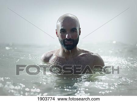 a man in the water; tarifa, cadiz, andalusia, spain View Large Photo Image Picture - a man in the water; tarifa, cadiz, andalusia, spain. Fotosearch