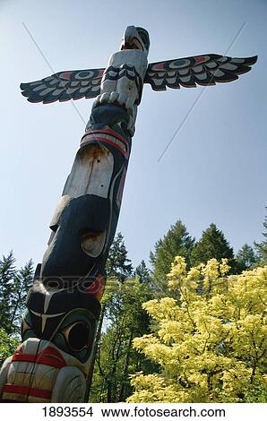 Picture - a native indian wood totem pole; victoria, british columbia, canada. Fotosearch