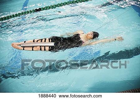 a paraplegic woman swims in a pool; edmonton, alberta, canada View Large Photo Image Stock Image - a paraplegic woman swims in a pool; edmonton, alberta, canada. Fotosearch