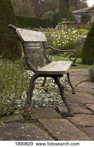 a park bench on a stone walkway; northumberland, england View Large Photo Image Stock Photo - a park bench on a stone walkway; northumberland, england. Fotosearch