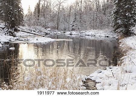 a pond in winter; thunder bay, ontario, canada View Large Photo Image Stock Photo - a pond in winter; thunder bay, ontario, canada. Fotosearch