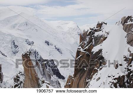 a snowy mountain range; chamonix, france View Large Photo Image Stock Photo - a snowy mountain range; chamonix, france. Fotosearch