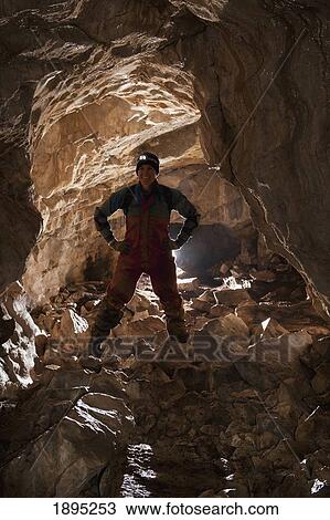 an athletic female caver; fernie, british columbia, canada View Large Photo Image Stock Image - an athletic female caver; fernie, british columbia, canada. Fotosearch