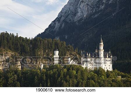bavarian castle on a mountain side at sunset; fussen, germany View Large Photo Image Stock Image - bavarian castle on a mountain side at sunset; fussen, germany. Fotosearch