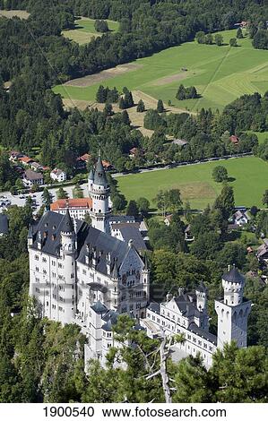 Stock Image - bavarian castle on a mountain side with fields in the background; fussen, germany. Fotosearch