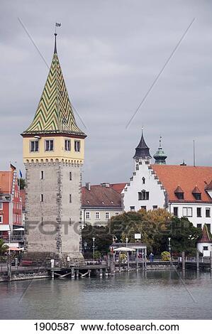 bavarian tower with colorful tile roof along the waterfront; lindau, germany View Large Photo Image Stock Photo - bavarian tower with colorful tile roof along the waterfront; lindau, germany. Fotosearch