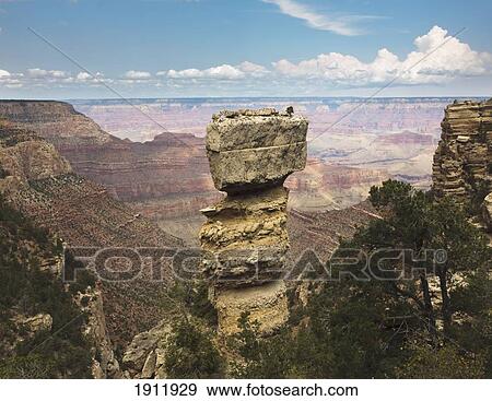 Stock Photo - boulder balanced on a column (hoodoo) in the grand canyon; arizona, united states of america. Fotosearch