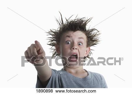 boy with crazy hair pointing his finger View Large Photo Image Stock Photo - boy with crazy hair pointing his finger. Fotosearch