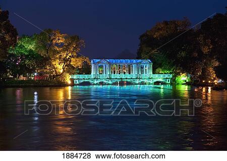 Stock Photo - bridge at night with changing colors of lights; guilin, guangxi, china. Fotosearch