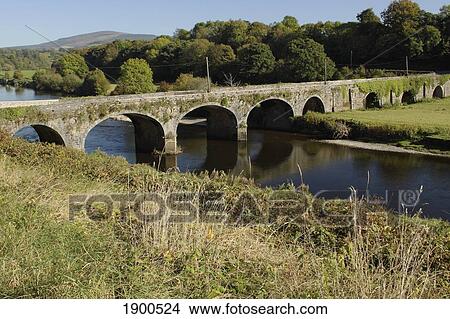 bridge over the river nore near inistioge in the leinster region; county kilkenny, ireland View Large Photo Image Picture - bridge over the river nore near inistioge in the leinster region; county kilkenny, ireland. Fotosearch