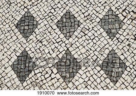 Stock Image - cobblestone in the main square of praca rodrigues lobo; leiria, portugal. Fotosearch