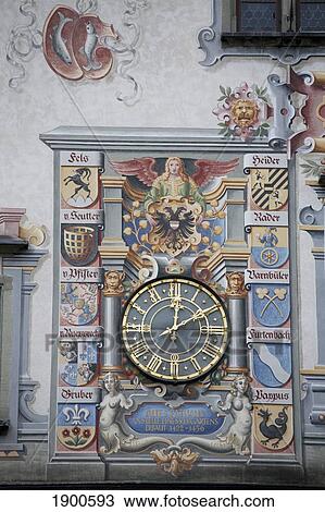 detail of a decorative painted wall with a town clock; lindau, germany View Large Photo Image Stock Image - detail of a decorative painted wall with a town clock; lindau, germany. Fotosearch