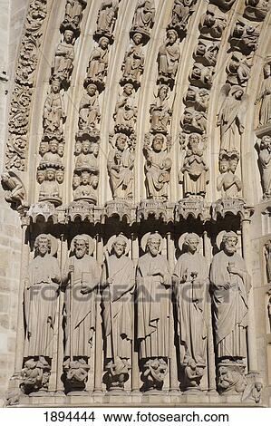 Picture - detail of some of the apostle statues of the last judgement on the last judgement and central portal at notre-dame cathedral; paris, france. Fotosearch