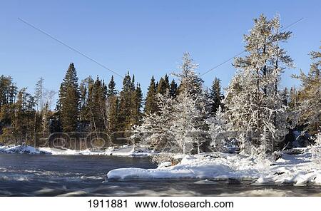 Stock Image - frost and ice along the river; thunder bay, ontario, canada. Fotosearch