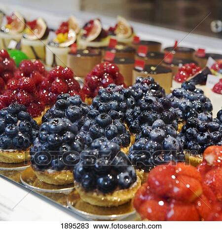 fruit tarts on display in a window; munich, germany View Large Photo Image Stock Image - fruit tarts on display in a window; munich, germany. Fotosearch
