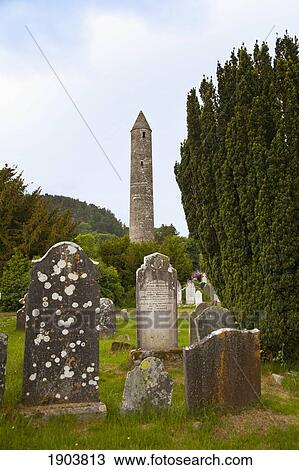 gravestones in a cemetery and a round tower on a 6th century monastic site; glendalough, county wicklow, ireland View Large Photo Image Stock Image - gravestones in a cemetery and a round tower on a 6th century monastic site; glendalough, county wicklow, ireland. Fotosearch