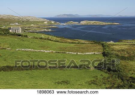 green fields and a little farmhouse on the coastline of the beara peninsula in munster province; county cork, ireland View Large Photo Image Stock Image - green fields and a little farmhouse on the coastline of the beara peninsula in munster province; county cork, ireland. Fotosearch