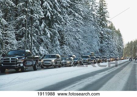 heavy traffic after a snow storm on mount hood; oregon, united states of america View Large Photo Image Stock Photo - heavy traffic after a snow storm on mount hood; oregon, united states of america. Fotosearch