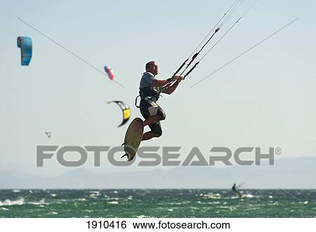 kitesurfing; tarifa, cadiz, andalusia, spain View Large Photo Image Stock Photograph - kitesurfing; tarifa, cadiz, andalusia, spain. Fotosearch