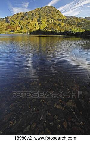 Stock Image - kylemore lake in connacht region; connemara, county galway, ireland. Fotosearch