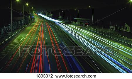 light trails down a busy road at night; dublin, ireland View Large Photo Image Stock Image - light trails down a busy road at night; dublin, ireland. Fotosearch