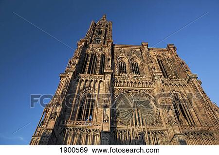 low angle of a cathedral against a blue sky; strasbourg, france View Large Photo Image Stock Photo - low angle of a cathedral against a blue sky; strasbourg, france. Fotosearch