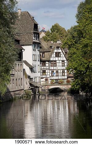 medieval timber style buildings reflected in a canal; strasbourg, france View Large Photo Image Stock Image - medieval timber style buildings reflected in a canal; strasbourg, france. Fotosearch