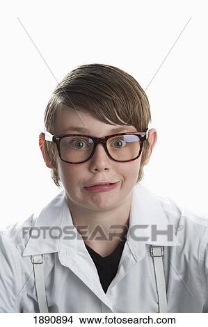Picture - nerdy kid in glasses. Fotosearch