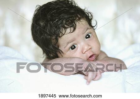portrait of a baby with a full head of dark hair; troutdale, oregon, united states of america View Large Photo Image Stock Photography - portrait of a baby with a full head of dark hair; troutdale, oregon, united states of america. Fotosearch