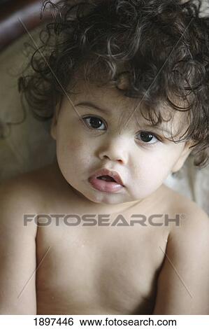 portrait of a child with dark, curly hair; troutdale, oregon, united states of america View Large Photo Image Stock Photograph - portrait of a child with dark, curly hair; troutdale, oregon, united states of america. Fotosearch