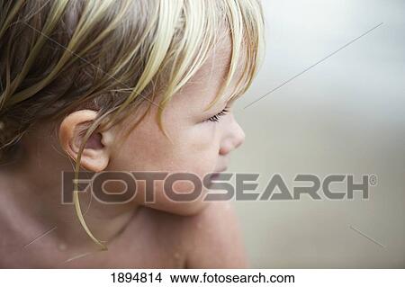 portrait of a child with wet hair and bare shoulders; currumbin, gold coast, queensland, australia View Large Photo Image Picture - portrait of a child with wet hair and bare shoulders; currumbin, gold coast, queensland, australia. Fotosearch
