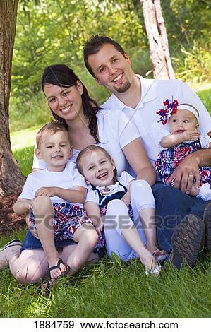 Stock Photo - portrait of a family with three children; portland, oregon, united states of america. Fotosearch