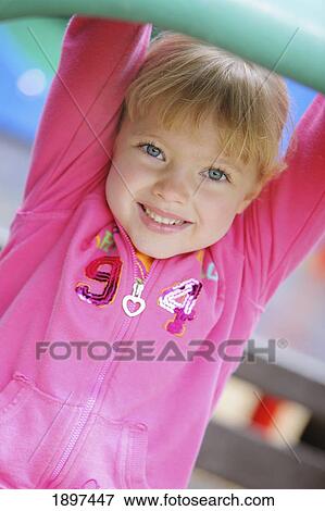 portrait of a girl at the playground; troutdale, oregon, united states of america View Large Photo Image Stock Photo - portrait of a girl at the playground; troutdale, oregon, united states of america. Fotosearch