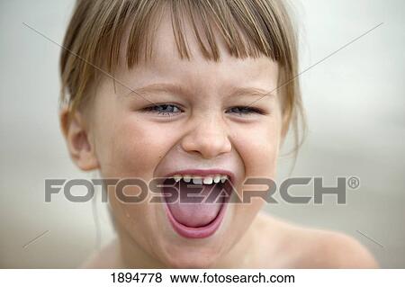 portrait of a girl laughing; gold coast, queensland, australia View Large Photo Image Stock Photo - portrait of a girl laughing; gold coast, queensland, australia. Fotosearch