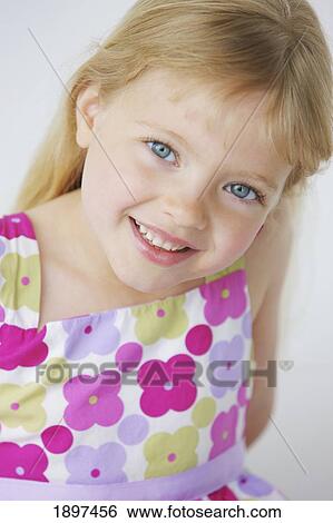 portrait of a girl with long, blond hair and blue eyes; troutdale, oregon, united states of america View Large Photo Image Stock Photograph - portrait of a girl with long, blond hair and blue eyes; troutdale, oregon, united states of america. Fotosearch