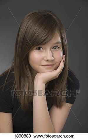 Stock Photo - portrait of a teenage girl. Fotosearch