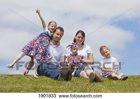 portrait of a young family in the park; portland, oregon, united states of america View Large Photo Image Stock Image - portrait of a young family in the park; portland, oregon, united states of america. Fotosearch