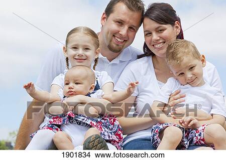 portrait of a young family; portland, oregon, united states of america View Large Photo Image Picture - portrait of a young family; portland, oregon, united states of america. Fotosearch