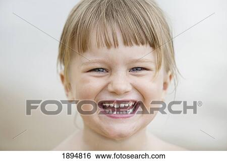 portrait of a young girl with a big smile; currumbin, gold coast, queensland, australia View Large Photo Image Stock Photograph - portrait of a young girl with a big smile; currumbin, gold coast, queensland, australia. Fotosearch