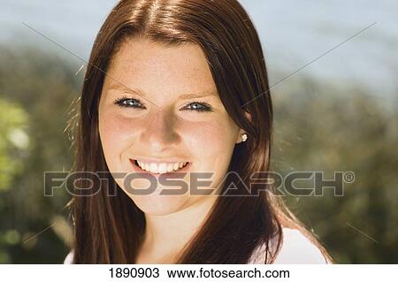 portrait of a young woman; wilmar, minnesota, united states of america View Large Photo Image Stock Image - portrait of a young woman; wilmar, minnesota, united states of america. Fotosearch