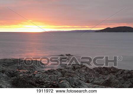 rocky shoreline of lake superior at sunset; wawa, ontario, canada View Large Photo Image Stock Image - rocky shoreline of lake superior at sunset; wawa, ontario, canada. Fotosearch