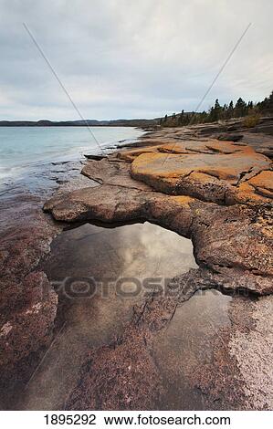rocky shoreline of lake superior; marathon, ontario, canada View Large Photo Image Stock Image - rocky shoreline of lake superior; marathon, ontario, canada. Fotosearch