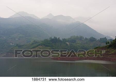 shennong stream near yangzi river and town of badong on a foggy day; hubei province, china View Large Photo Image Stock Image - shennong stream near yangzi river and town of badong on a foggy day; hubei province, china. Fotosearch