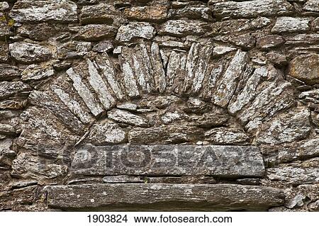 Picture - stone work in a design on a wall; county wicklow, ireland. Fotosearch