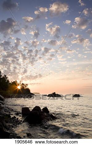 sunset on the south shores of lake superior; michigan, united states of america View Large Photo Image Stock Photograph - sunset on the south shores of lake superior; michigan, united states of america. Fotosearch